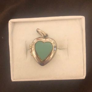 Antique silver heart locket with turquoise stone.